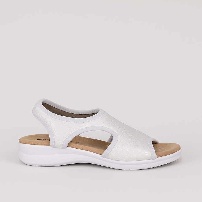 Euroflex Tuscany Shimmer sandals in white with a sleek design, featuring shimmering straps and a comfortable flat sole.