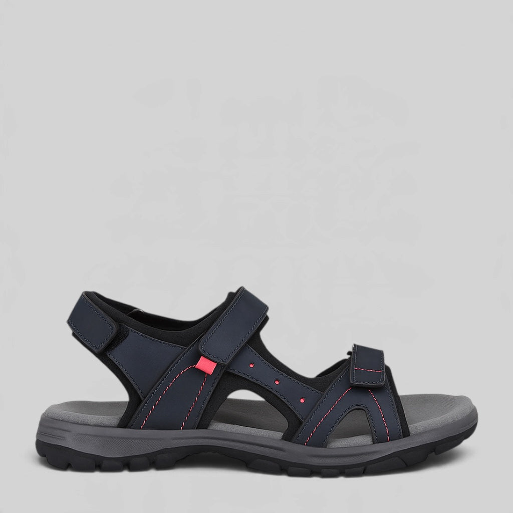 Black Cabello Trekk Navy sandals displayed on a stand, featuring open toes and adjustable straps for comfortable summer wear.