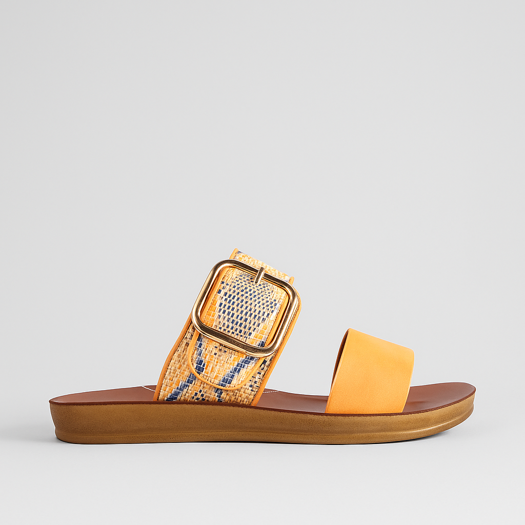 Los Cabos Doti Sunset multi flats displayed on a stylish sandal stand, showcasing vibrant colors and casual slip-on design.