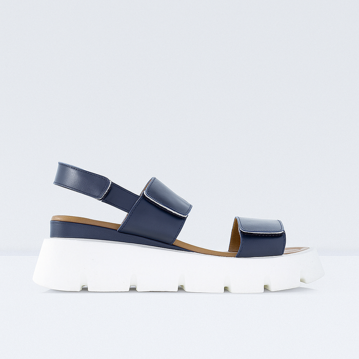Le Sansa navy silver chunky sandals with wide straps and a sturdy heel, stylish and comfortable for casual wear.