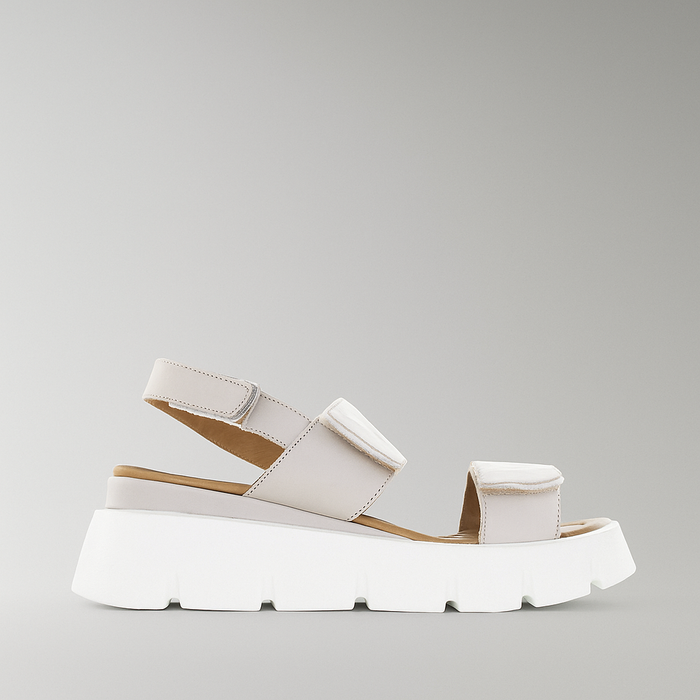 Le Sansa silver grey platform sandals with stylish straps and chunky heel, perfect for casual or dressy summer outfits.