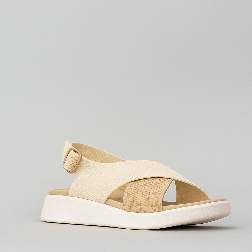 Los Cabos Bogota ivory sandals displayed on a neutral background, featuring beige straps and a comfortable slip-on design.