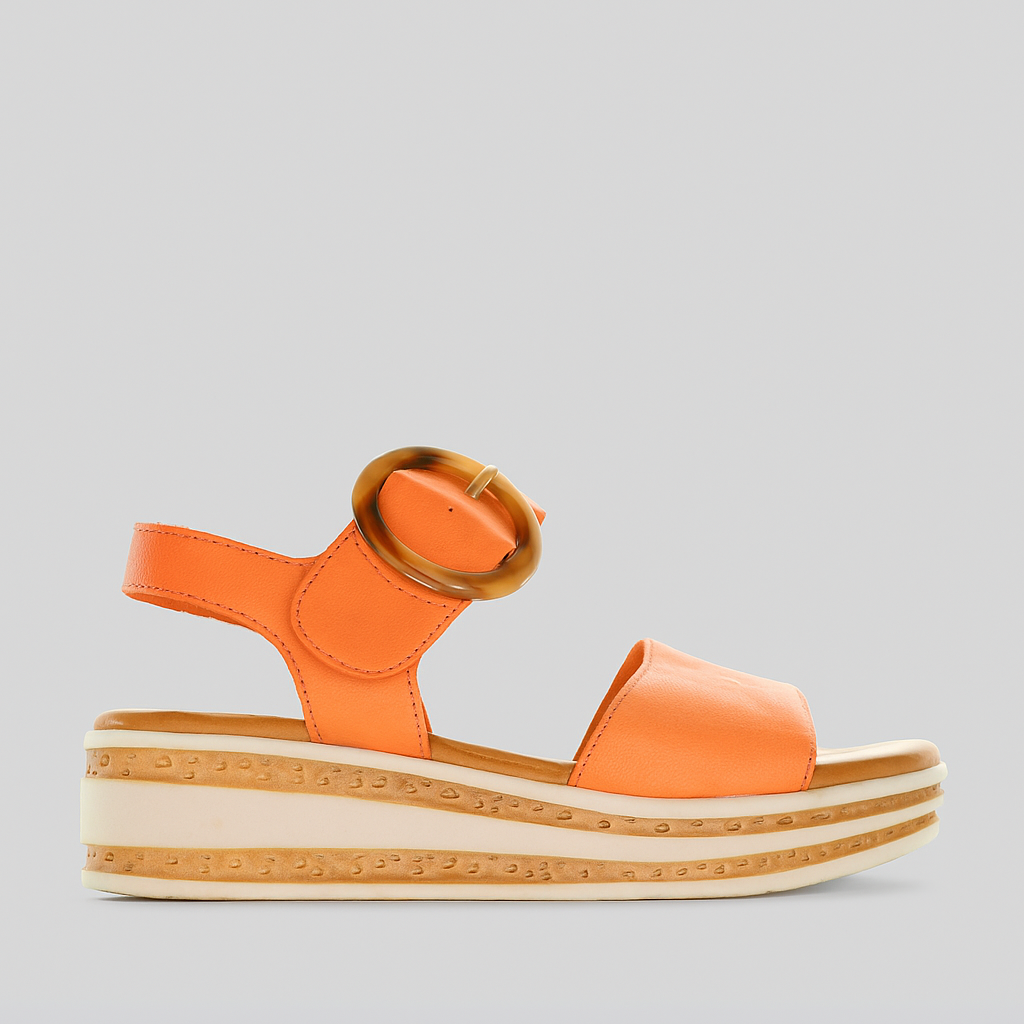 Orange Le Sansa Sansa Guard sunburn sandals with strappy design and cushioned soles, perfect for summer wear.