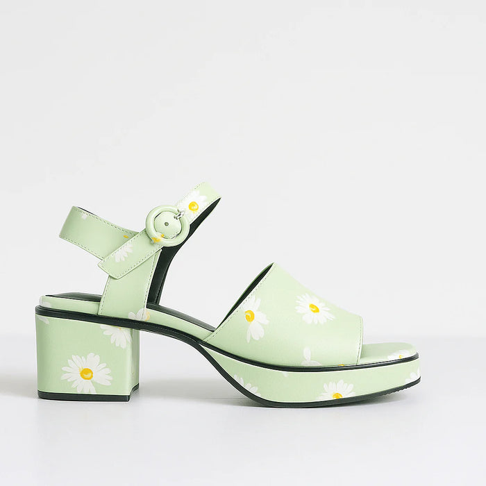 Le Sansa Ryalay Mint Floral sandals featuring green straps with daisy floral accents and a comfortable open-toe design.