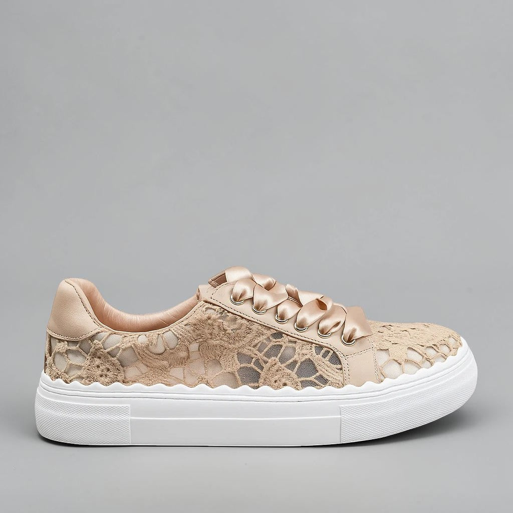 LE SANSA Quinn taupe sneakers with lace-up design, stylish casual footwear on a neutral background.