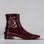 LE SANSA Sasha Merlot Patent Boots showing glossy burgundy leather with sleek design and pointed toe.