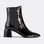 Black EOS Charcoal Boots with sleek design, featuring laces and sturdy soles, ideal for stylish casual or outdoor wear.