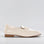 Naked Arches JAP Nude Patent loafers in shiny beige patent leather with sleek slip-on design and rounded toes.