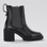 Black LE SANSA Samira boots with sleek design and shadow effect, featuring a stylish silhouette and pointed toe.