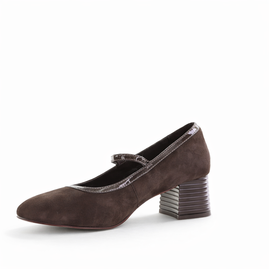 Le Sansa Zafira chocolate heels with sleek design and pointed toe, showing the stylish footwear from a side angle.