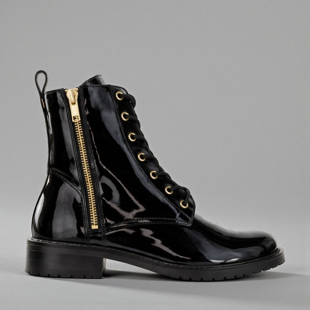 Le Sansa Black Patent Boots with sleek, shiny finish and pointed toes, stylish and modern footwear for fashionable looks.