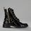 Black patent LE SANSA Sansa Fin boots with sleek design and pointed toe, stylish footwear for casual or formal wear.