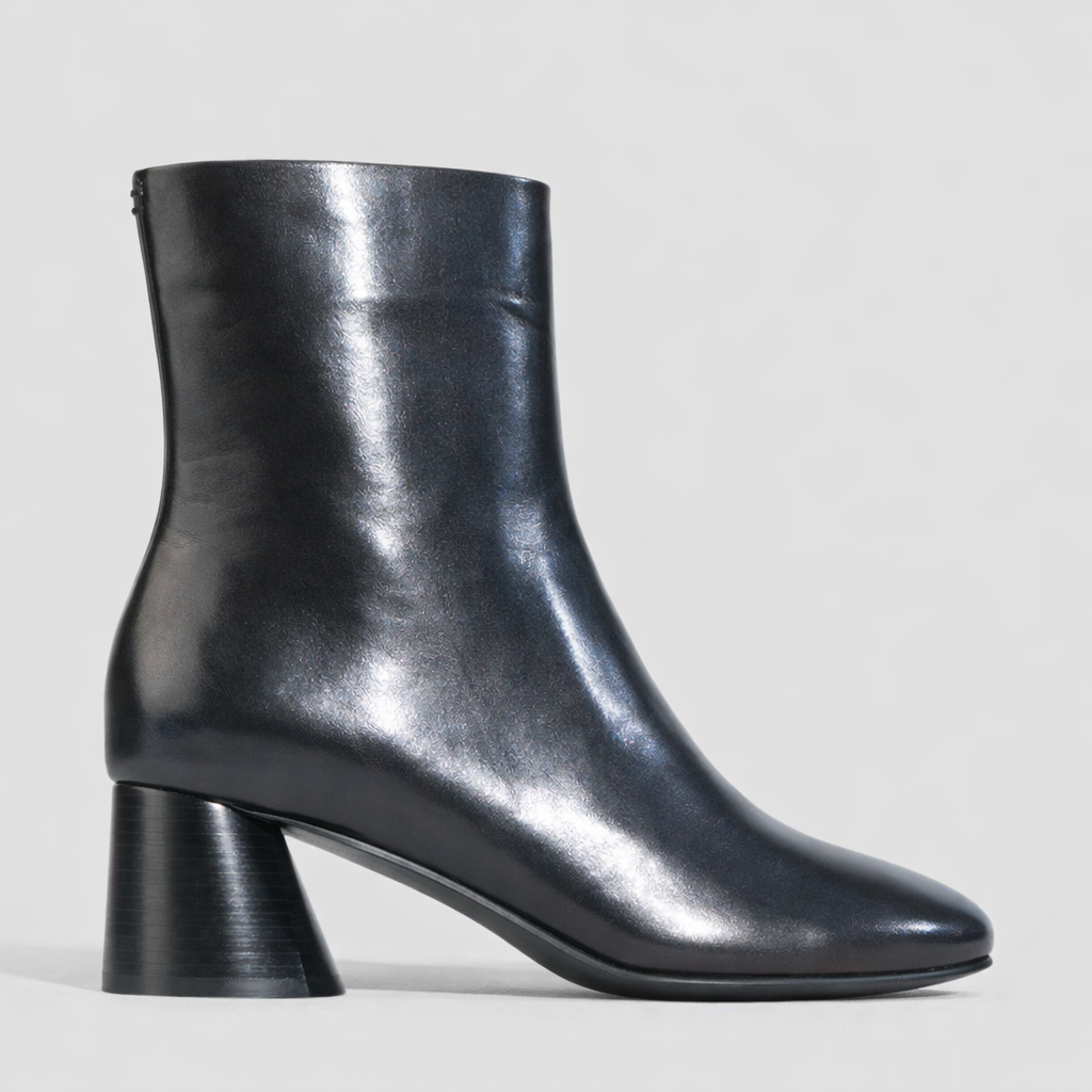 Black EOS Harlyn boots with glossy finish and lace-up design, stylish footwear for casual or dressy occasions.