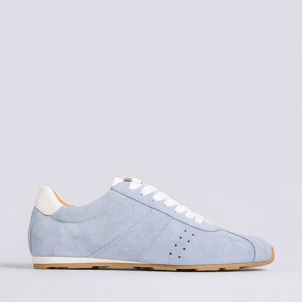 Light blue EOS JAS sneakers with stylish design, featuring light grey background for a modern look.