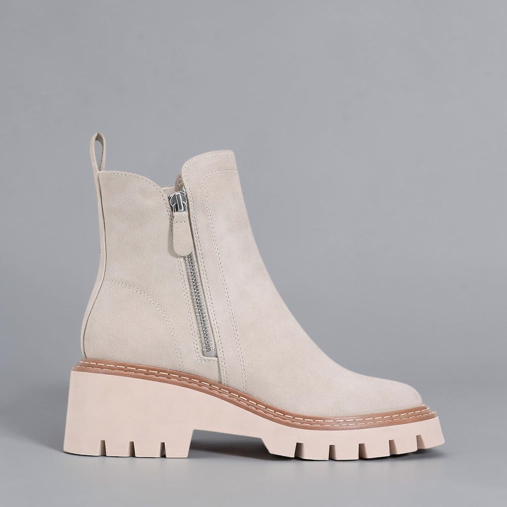 Los Cabos Vianne stone-colored boots with a stylish ankle design, displayed on a neutral grey background.