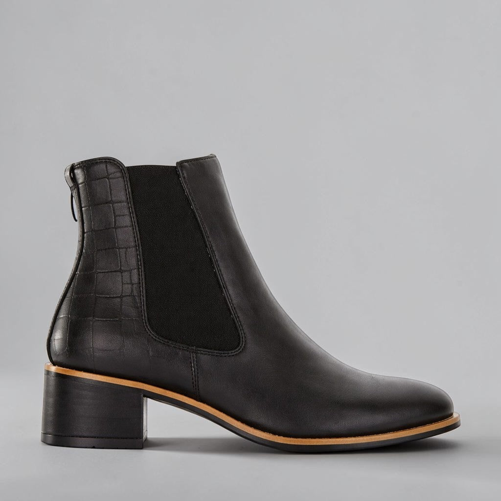 Black LE SANSA REMTON boots with sleek leather design and lace-up front, stylish footwear for casual or formal wear