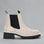 Silver grey LE SANSA ELBY boots with sleek design and pointed toes, displayed on a neutral background.