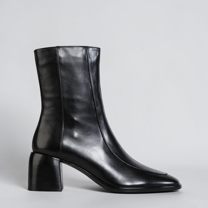 Black EOS Charline Boots with ankle-high design and lace-up closure, featuring a sleek, stylish look for casual or dressy wear.