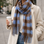 Minx checkers scarf in cornflower blue with a classic checkered pattern, lightweight fabric, and stylish design.