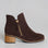 Naked Arches Oxley chocolate suede boots with a sleek design and rounded toe, photographed on a neutral background.
