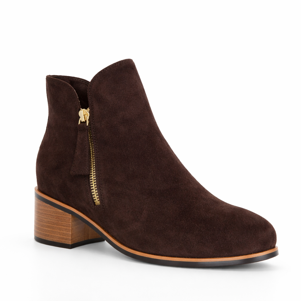 Naked Arches Oxley chocolate suede boots with a sleek ankle design and subtle stitching details.