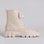 EOS FEBE STONE boots featuring a stylish design with textured leather and ankle-high silhouette, perfect for casual wear.