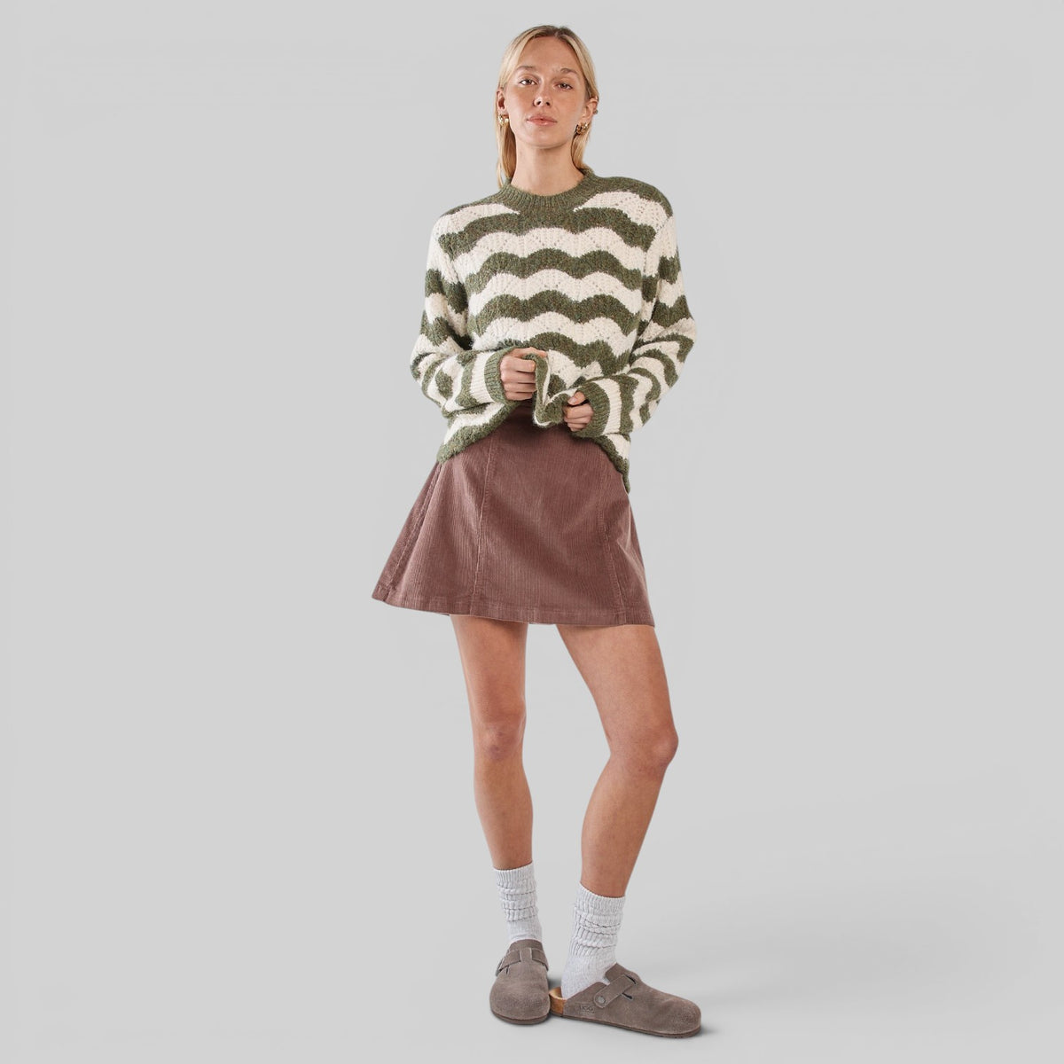 Sass Clothing Nikkita Wavy Stripe Knit Blazer in cream and olive, featuring a stylish wavy stripe pattern and tailored fit.