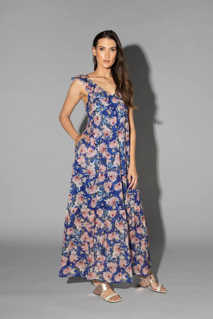 Drama The Label Mid Summer Dress in cyan with floral pattern, featuring a stylish and flowy dress design.