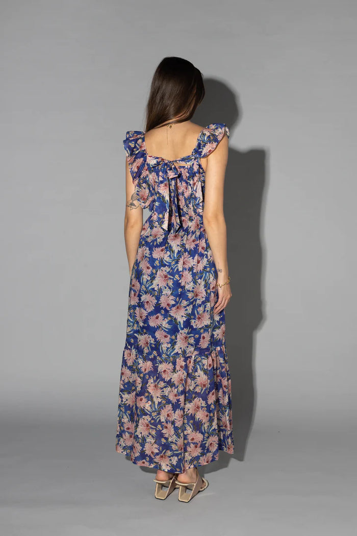 Drama The Label mid-summer dress in cyan with a floral pattern, featuring a flowy design and sleeveless style.