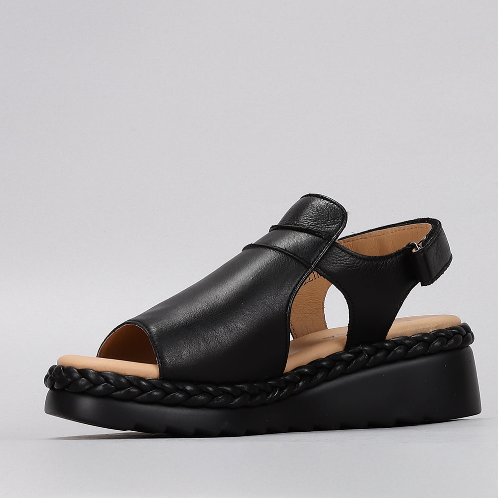 Black Le Sansa Sansa Emmeline sandals with open toe design and ankle strap, displayed on a neutral background.