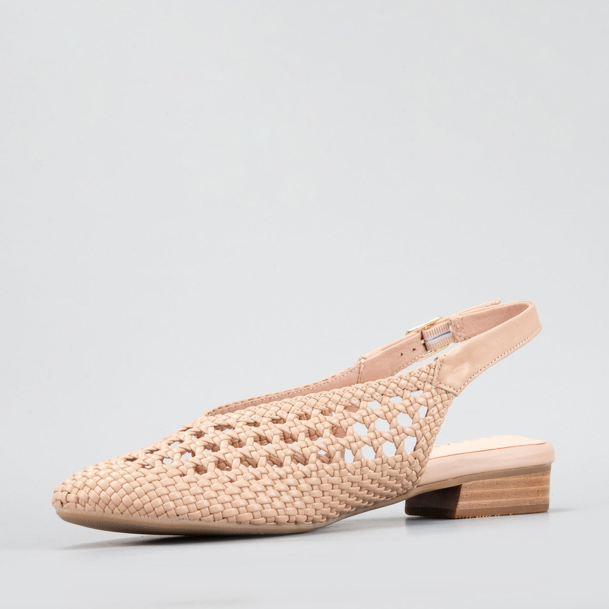 Le Sansa Camila Sandals in beige, stylish open-toe sandals with ankle straps and comfortable flat soles.