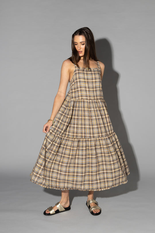 Drama The Label Earth Dress in ground check pattern, featuring a stylish dress with a fitted bodice and flowing skirt.