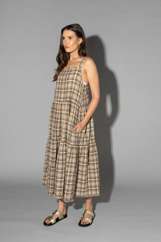 Drama The Label Earth Dress with ground check pattern, showcasing a stylish dress with a relaxed fit and earthy tones.