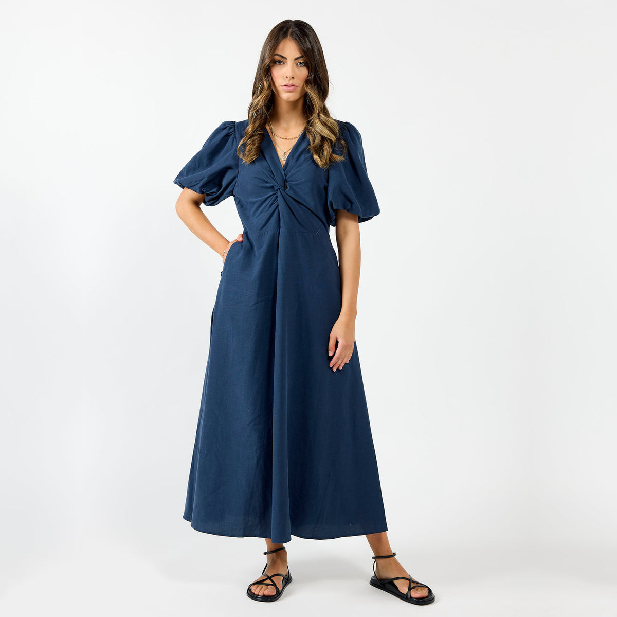 Drama The Label Halo Dress in Oxford Blue, a stylish sleeveless dress with a fitted silhouette and elegant design.