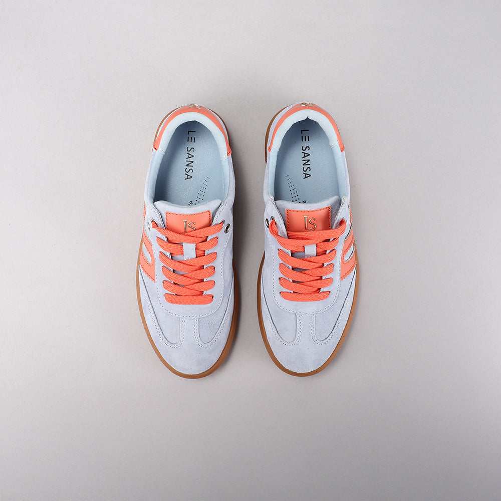 Le Sansa Juno pale blue and orange sneakers with stylish design and comfortable fit, shown from the side.