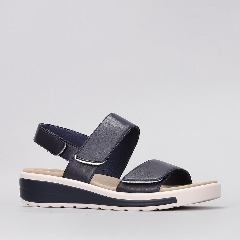 Naked Arches Hanza Navy sandals featuring navy straps and open-toe design, displayed on a neutral background.