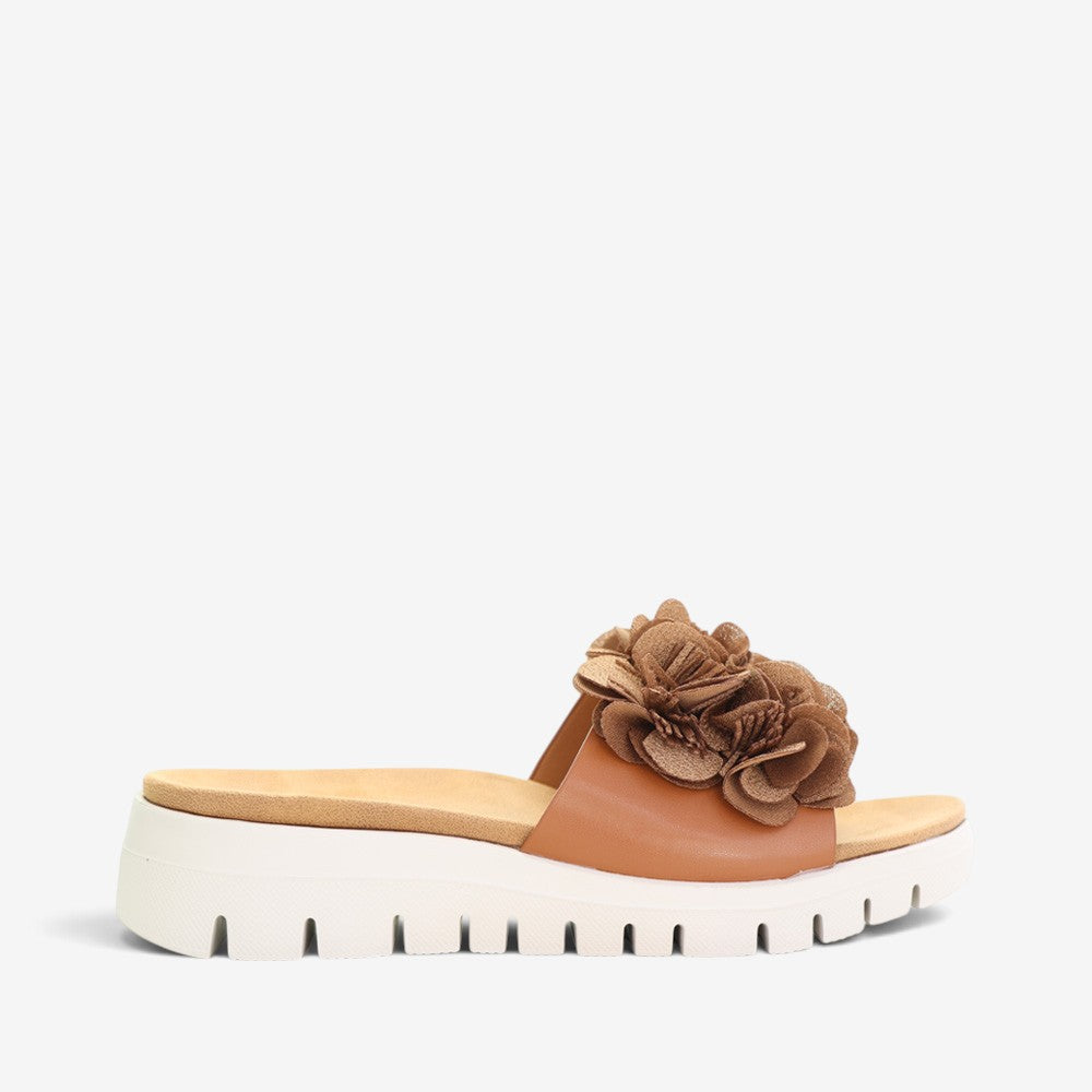 CC Resorts Domo Tan slip-on shoes with beige fabric upper and casual design, perfect for relaxed summer wear.