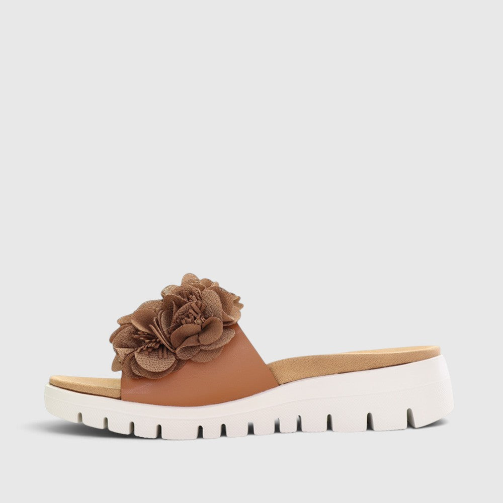 CC Resorts Domo Tan slip-on shoes, casual footwear with a tan color, featuring a comfortable design and slip-on style.