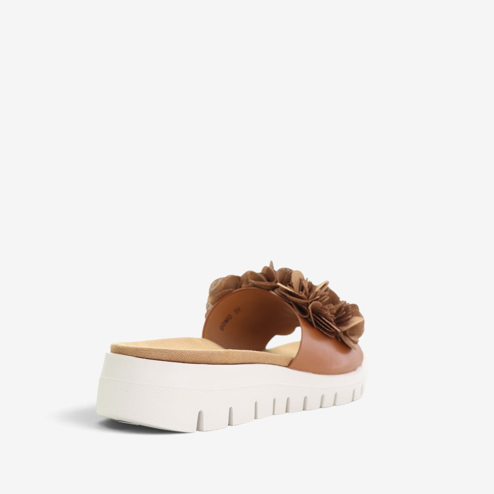 CC Resorts Domo Tan slip-on shoes with comfortable design and slip-on style, suitable for casual wear.