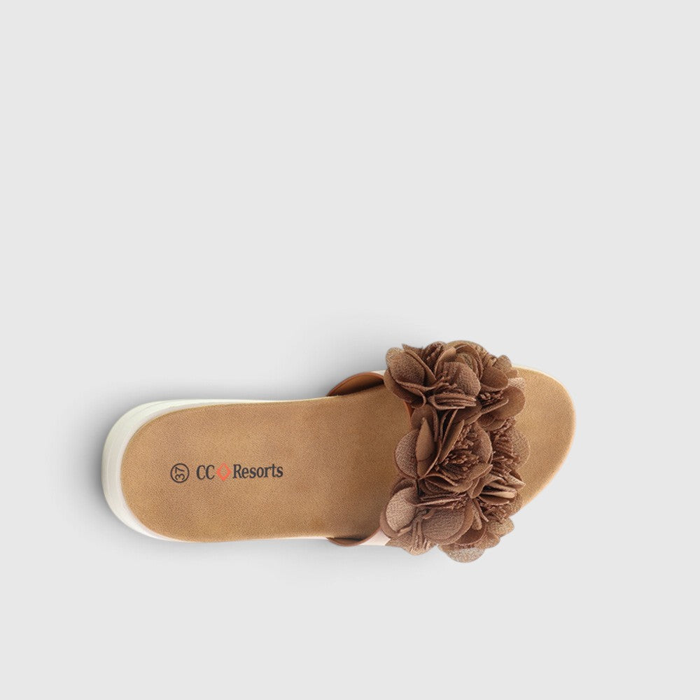 CC Resorts Domo Tan slip-ons featuring a casual design with tan fabric and comfortable slip-on style.
