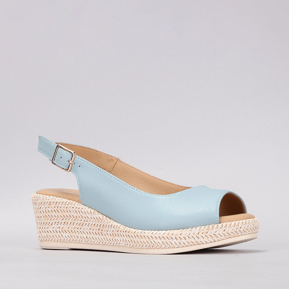Le Sansa Petunia Baby Blue sandals for kids, featuring soft blue straps and comfortable soles, ideal for everyday wear.