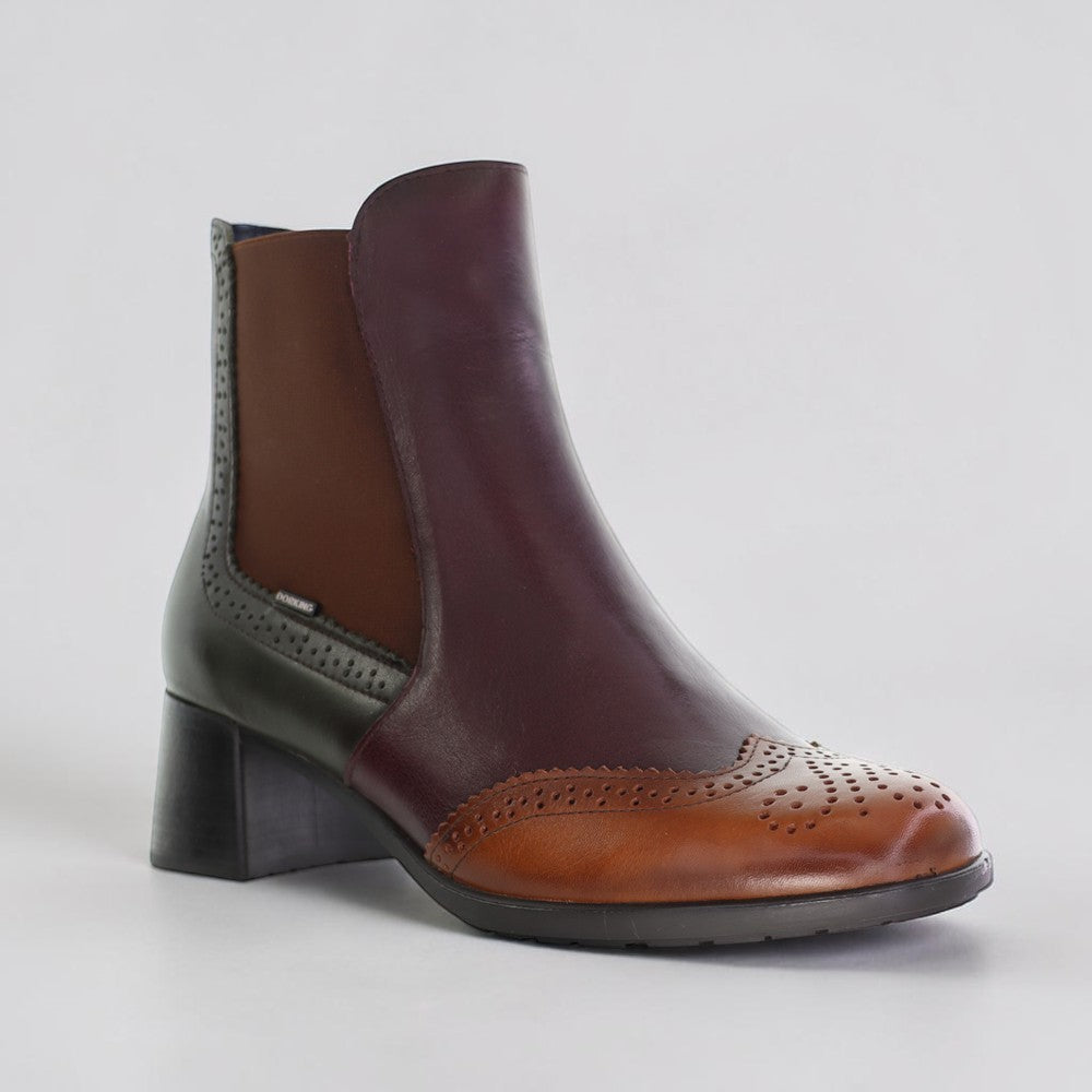 Dorking Ikia Bosque leather shoes with woven detailing and classic design, featuring tan color and stylish stitching.