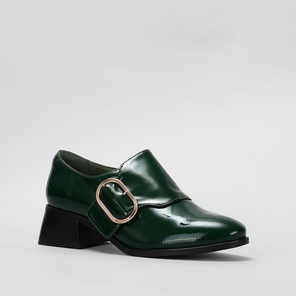 Le Sansa Green Rice Bottle loafers with sleek design, featuring green leather and stylish stitching for a modern look.