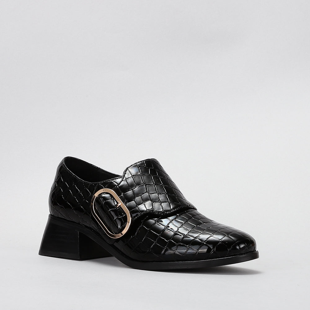 Le Sansa Rice Black Print loafers featuring a stylish black print design and classic slip-on style.
