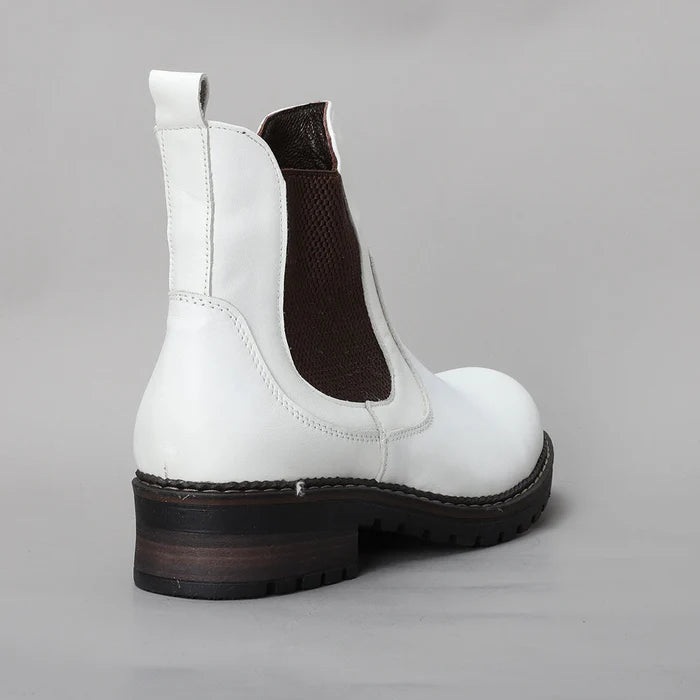 Off-white LE SANSA LESANSA Rio boots with ankle-height design and stylish lacing, perfect for casual and trendy outfits.