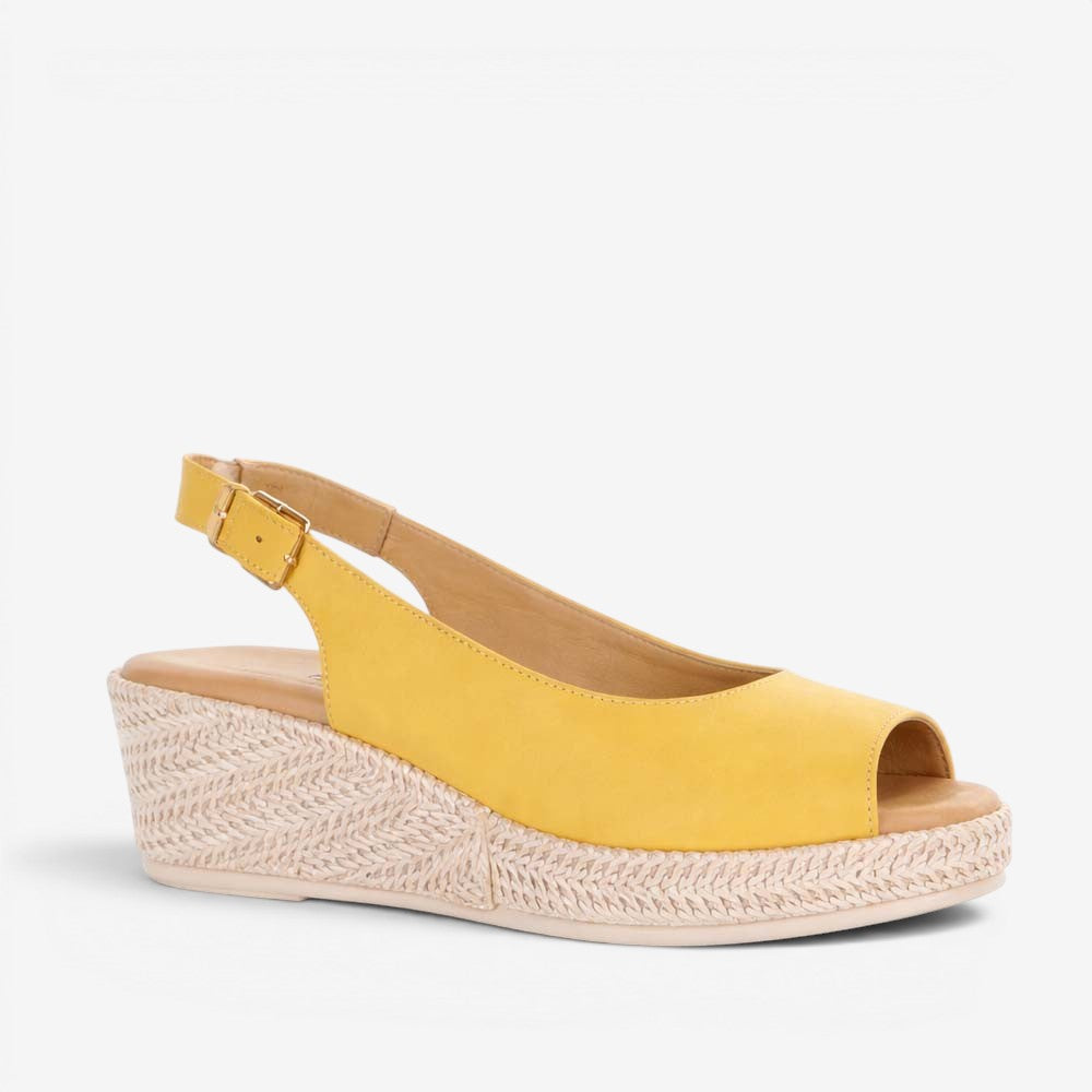 Le Sansa Petunia Mustard sandals with open toe design and ankle strap, featuring stylish mustard yellow color and casual summer style.