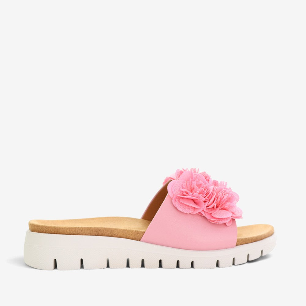 CC Resorts Domo baby pink slip-on shoes for infants with soft fabric and comfortable fit, ideal for casual wear.