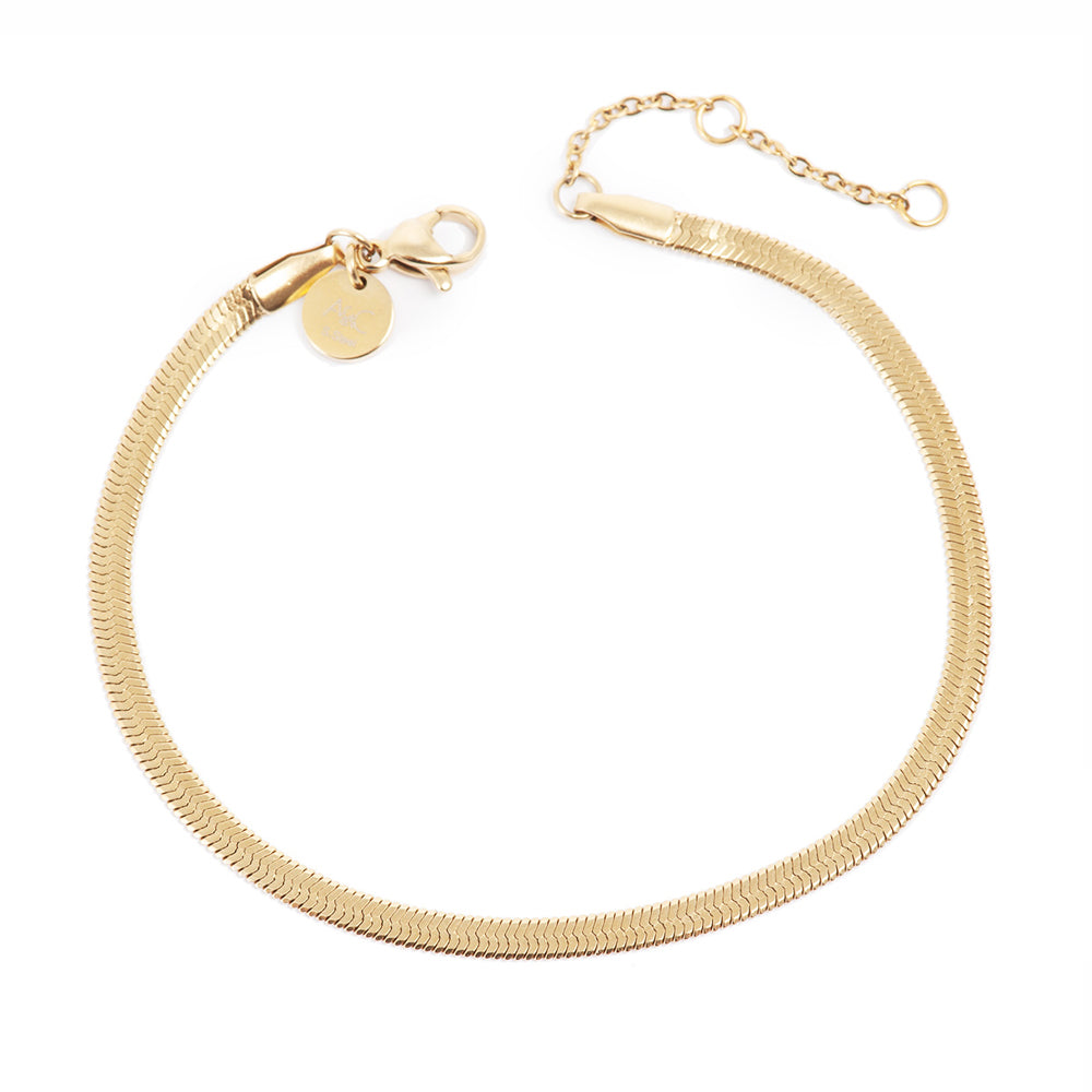 Gold plated snake chain bracelet from A & C Oslo with a sleek, flexible design and polished finish.