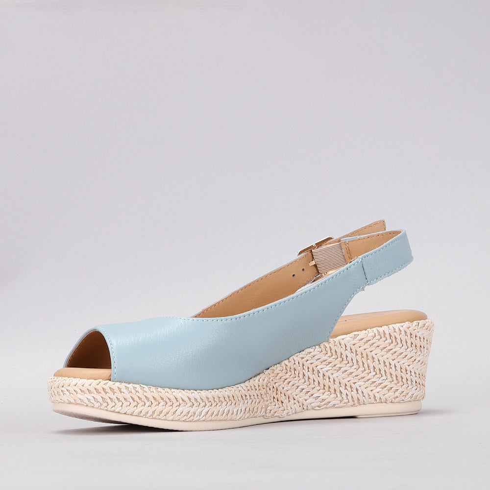 Le Sansa Petunia Baby Blue sandals with open toe design and ankle straps for comfortable summer wear.