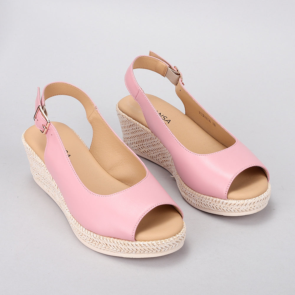 Le Sansa Petunia Baby Pink sandals for girls, featuring soft pink straps and comfortable design ideal for everyday wear.